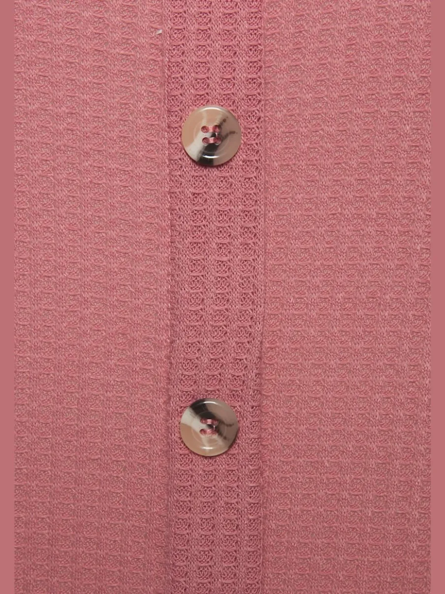 Débardeur sans manches avec patte de boutonnage et ceinture élastiquée
