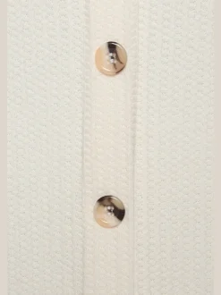 Débardeur sans manches avec patte de boutonnage et ceinture élastiquée