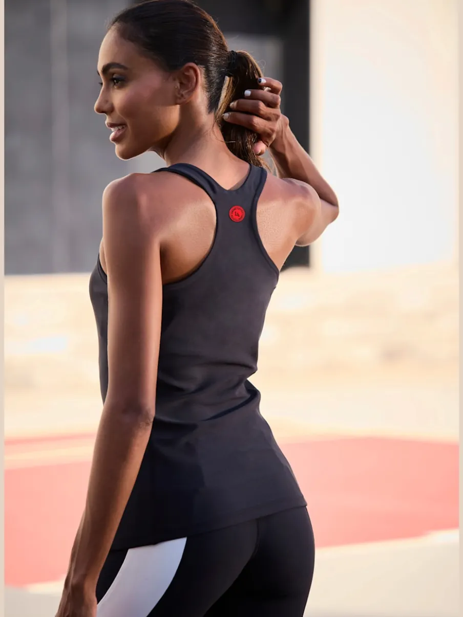Débardeurs sport respirants à dos nageur et coutures distinctes