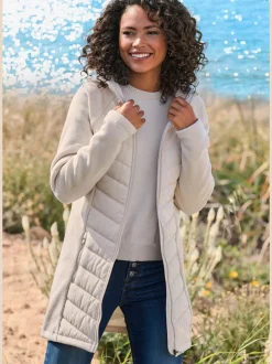 Doudoune matelassée avec manches en tricot polaire doux