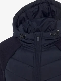 Doudoune matelassée avec manches en tricot polaire doux