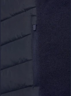 Doudoune matelassée avec manches en tricot polaire doux