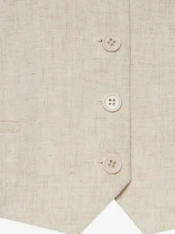 Gilet court à encolure en V avec patte de boutonnage