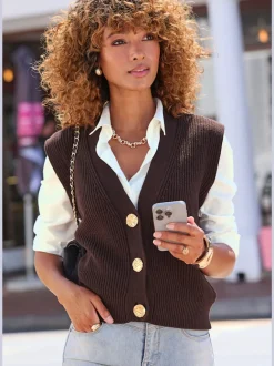 Gilet en tricot à col V profond avec boutons dorés et bords-côtes