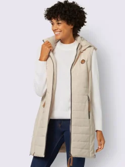 Gilet long matelassé avec col montant et capuche amovible