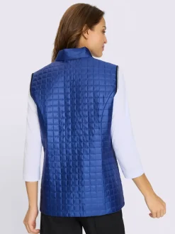 Gilet matelassé avec col montant et poches contrastées