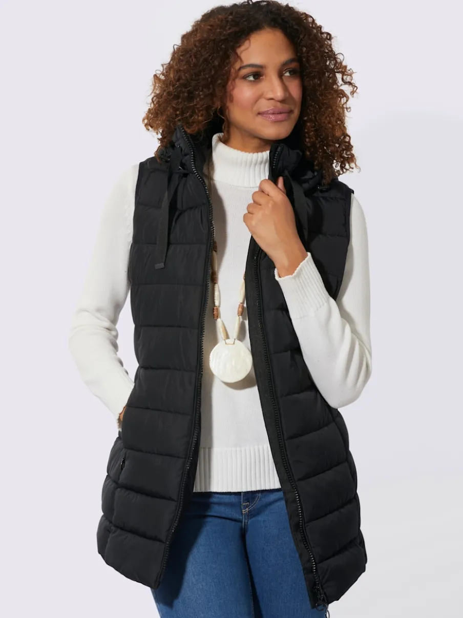 Gilet matelassé long avec col montant et capuche ajustable