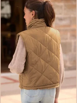 Gilet réversible en peluche avec col montant et dos matelassé