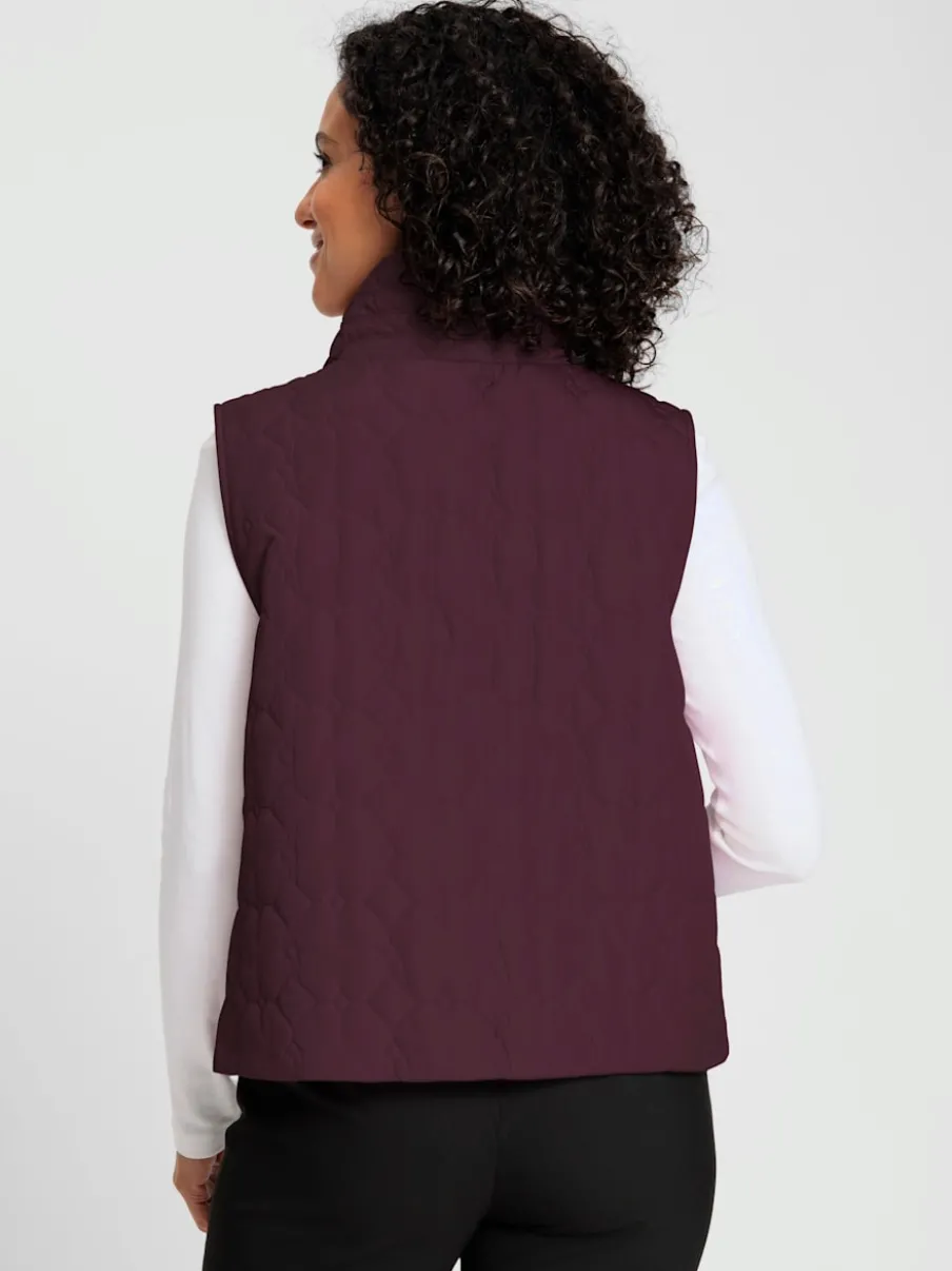 Gilets matelassés avec col montant et poches pratiques