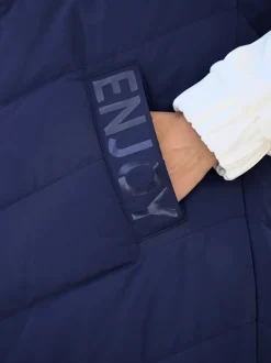 Gilets réversibles avec capuche et poches pratiques