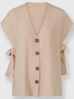 Gilet tricot ample encolure V avec liens noués