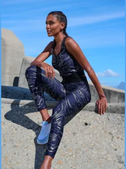 Hauts techniques courts avec glissière et ceinture élastique