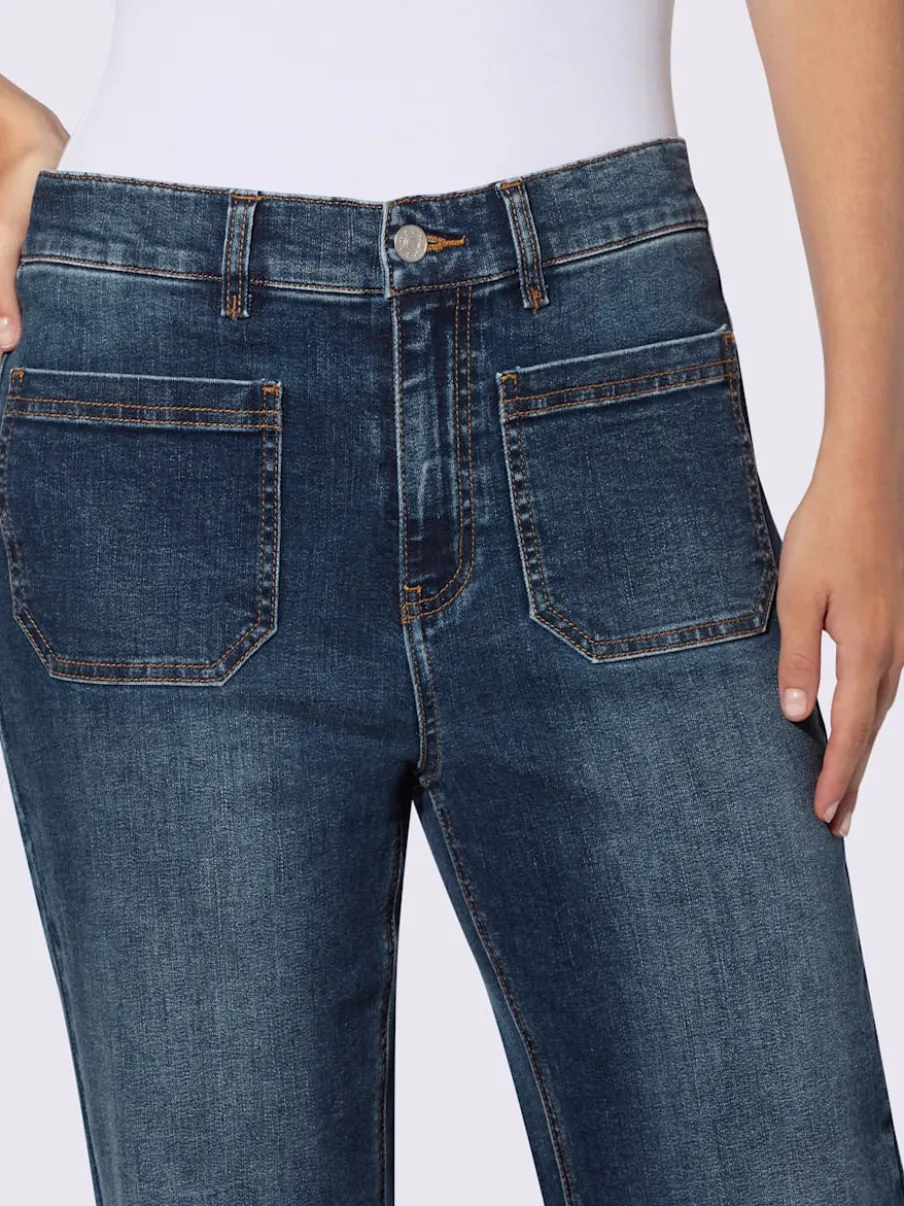 Jean bootcut doux extensible taille haute à poches