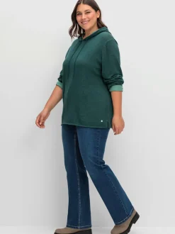 Jean bootcut pour les tailles fines avec des hanches marquées et un peu de ventre