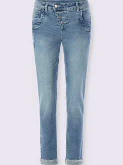 Jean boyfriend avec patte de boutonnage et franges