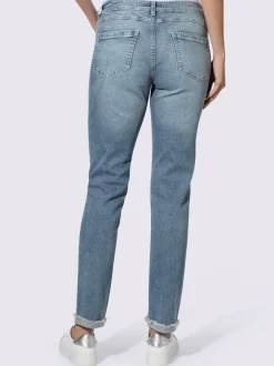 Jean boyfriend avec patte de boutonnage et franges