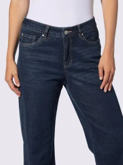 Jean cinq poches avec revers fixe jambes larges