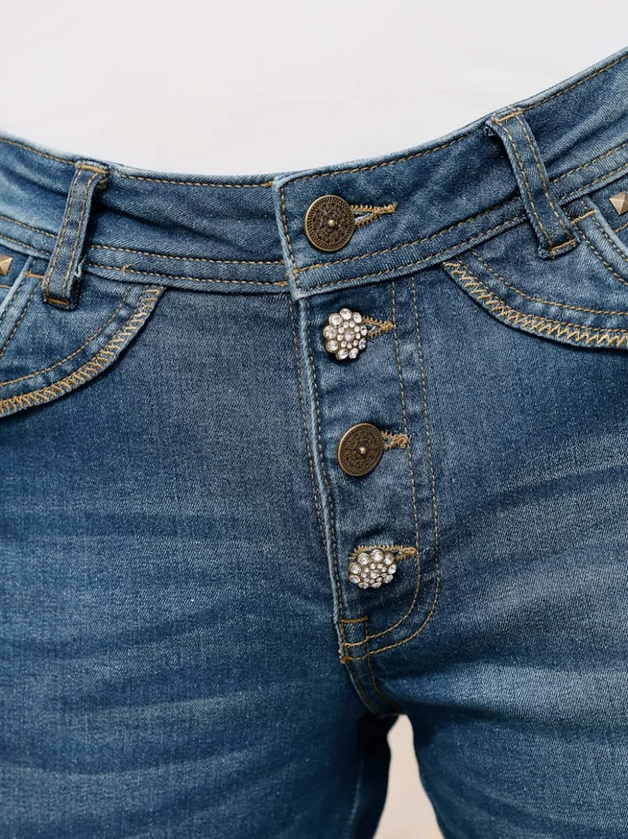 Jean cinq poches en coton avec boutons décoratifs brillants