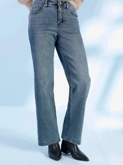 Jean coupe droite cinq poches avec rivets décoratifs