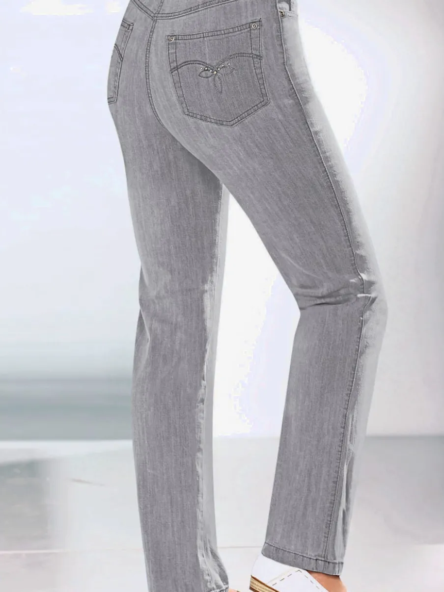 Jean à coupe élancée avec broderie sur poches arrière
