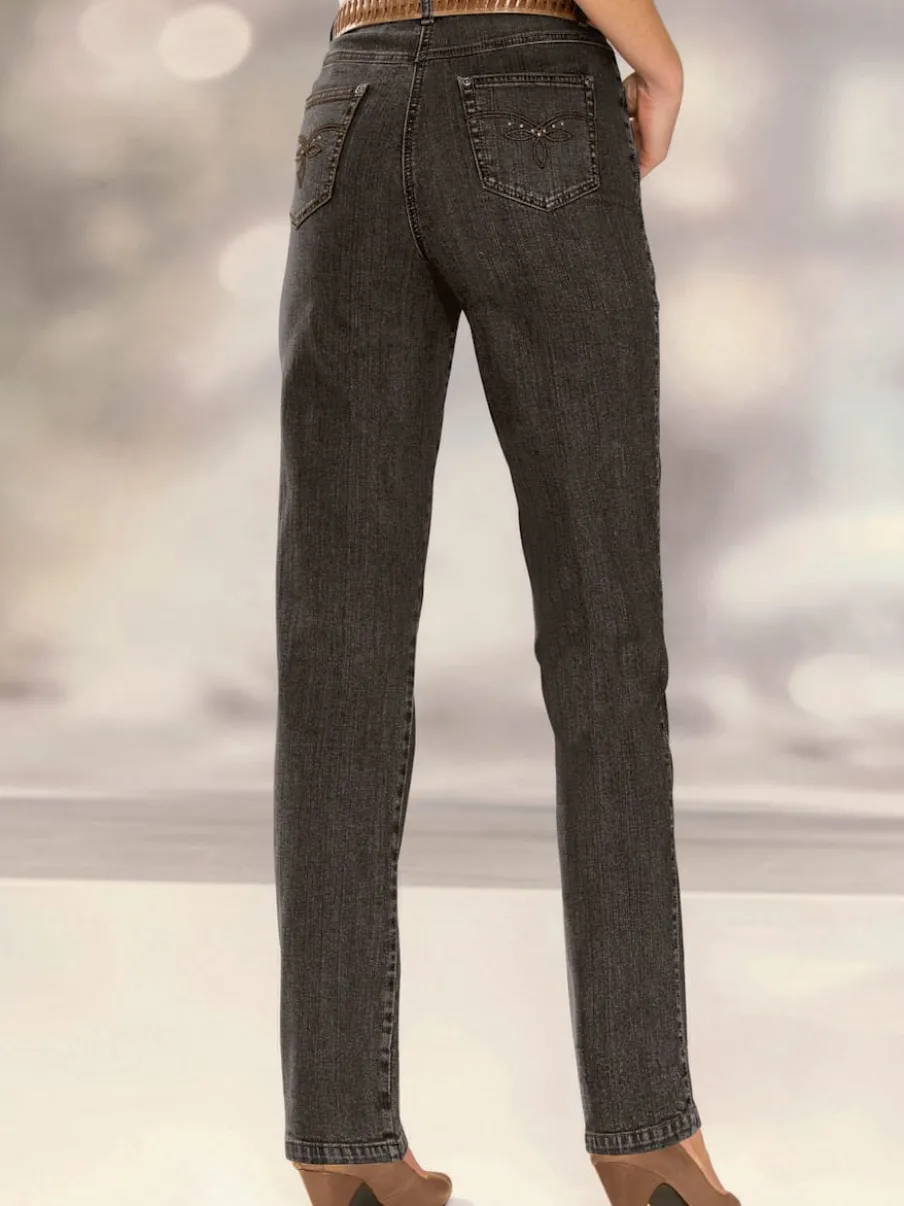Jean à coupe élancée avec broderie sur poches arrière