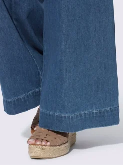 Jean coupe large avec poches devant et ourlet large