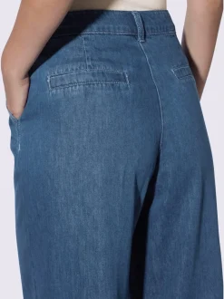 Jean coupe large avec poches devant et ourlet large