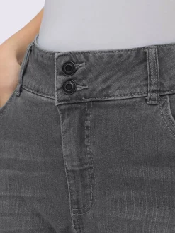 Jean denim classique coupe cinq poches avec rivets décoratifs