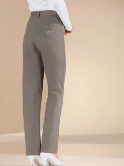 Jean droit avec ceinture élastique poches arrière brillantes.