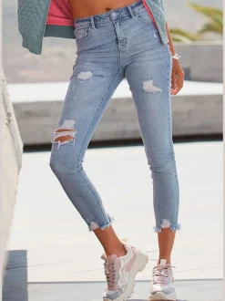 Jean effet déchiré en coupe Slim Fit avec cinq poches