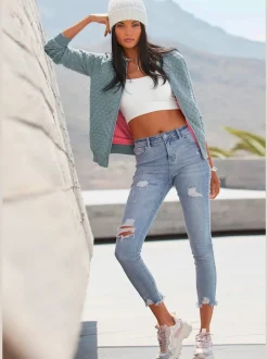 Jean effet déchiré en coupe Slim Fit avec cinq poches