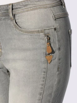 Jean effet délavé avec poches et ceinture gainante