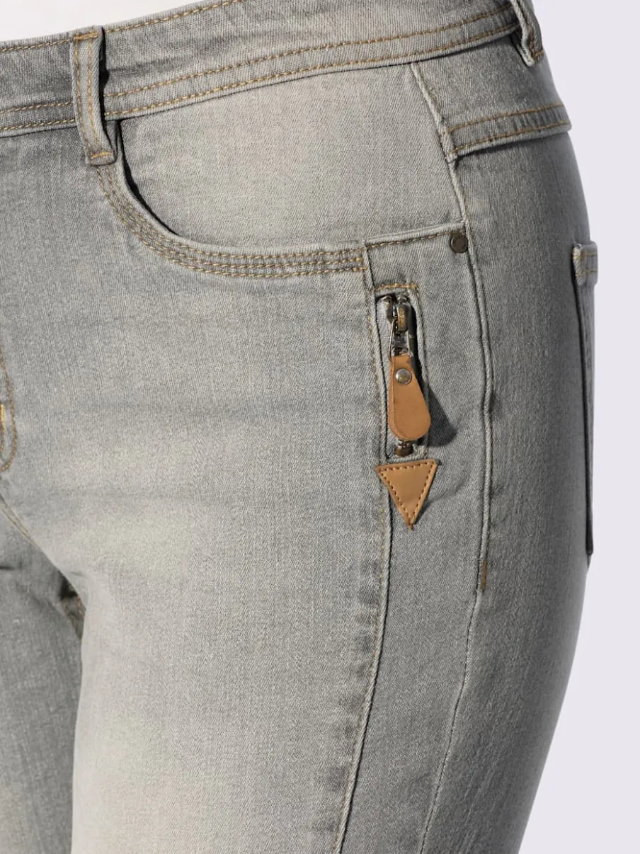 Jean effet délavé avec poches et ceinture gainante