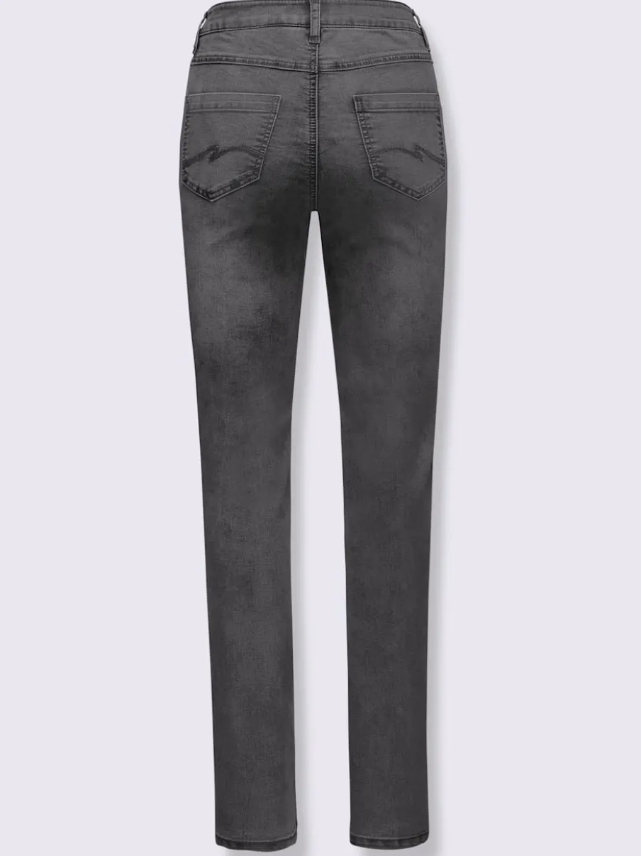Jean extensible cinq poches avec rivets décoratifs arrière