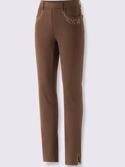 Jean extensible à fausse fermeture avec pierres brillantes et fente