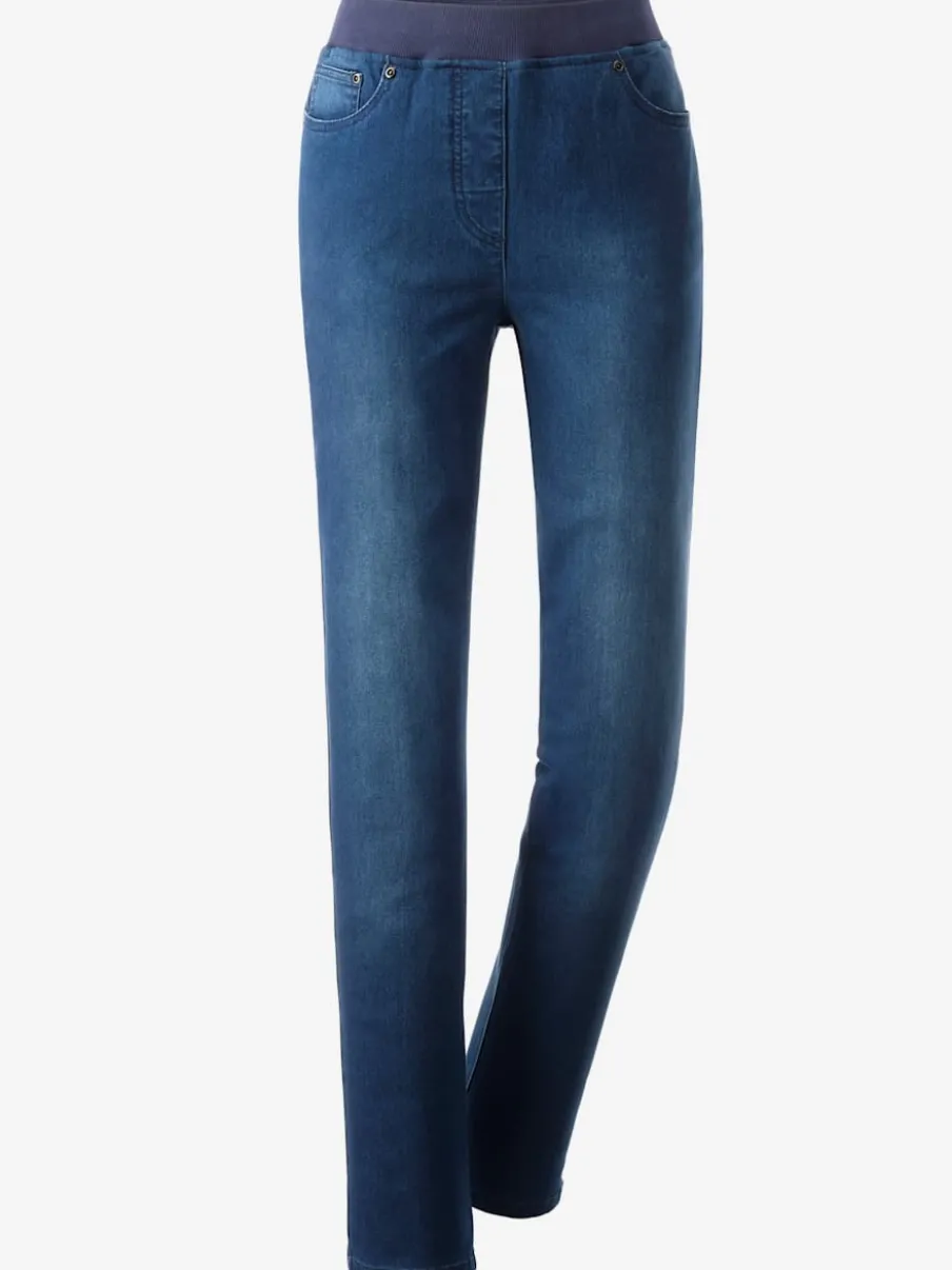 Jean facile à enfiler avec ceinture élastique intégrée.