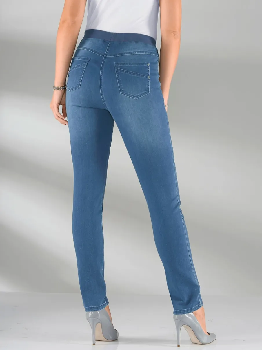 Jean facile à enfiler avec ceinture élastique intégrée.