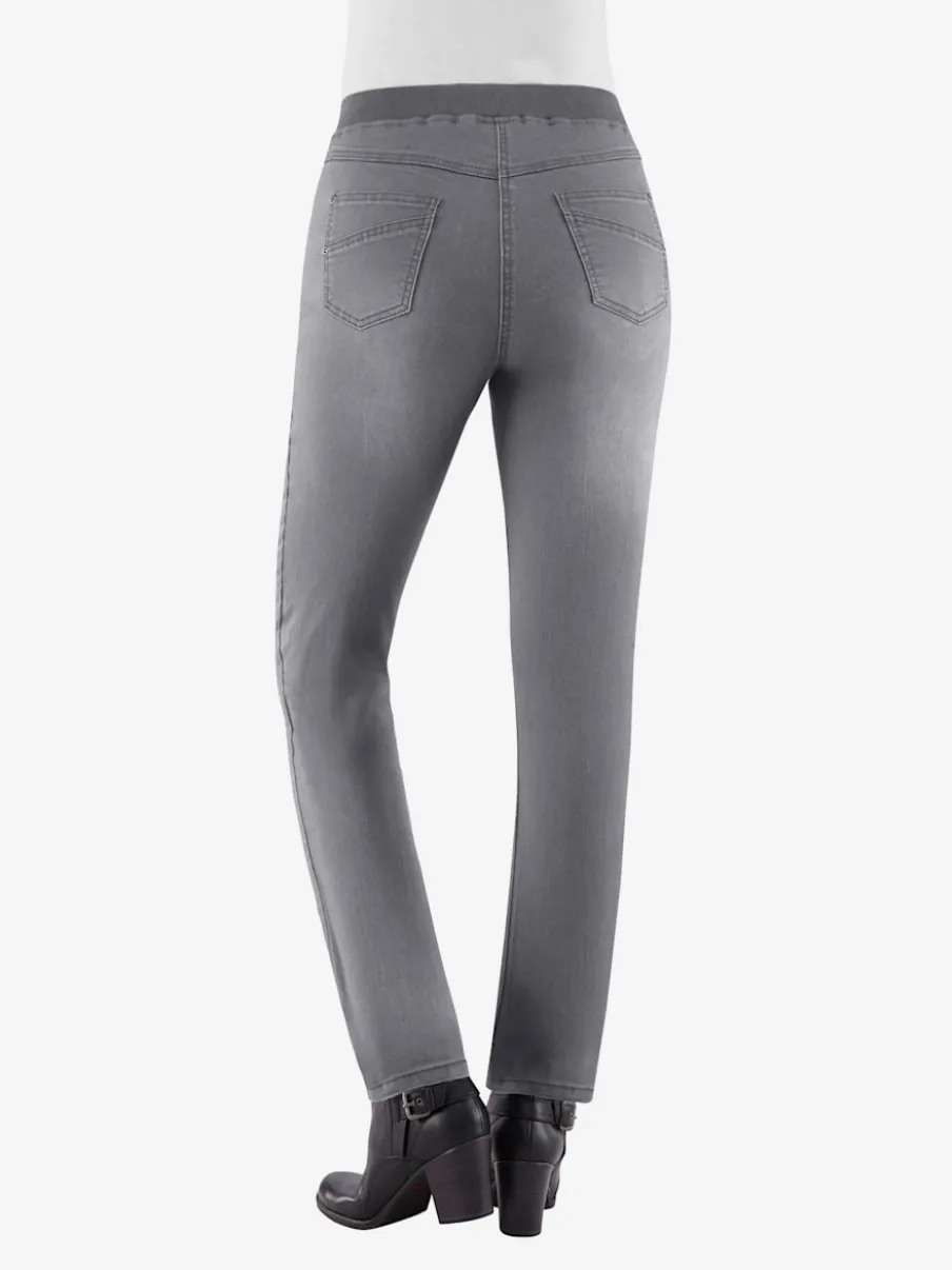Jean facile à enfiler avec ceinture élastique intégrée.
