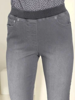 Jean facile à enfiler avec ceinture élastique intégrée.