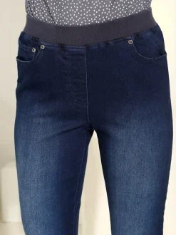 Jean facile à enfiler avec ceinture élastique intégrée.