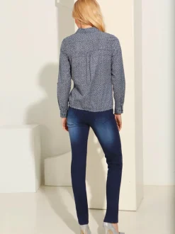 Jean facile à enfiler avec ceinture élastique intégrée.