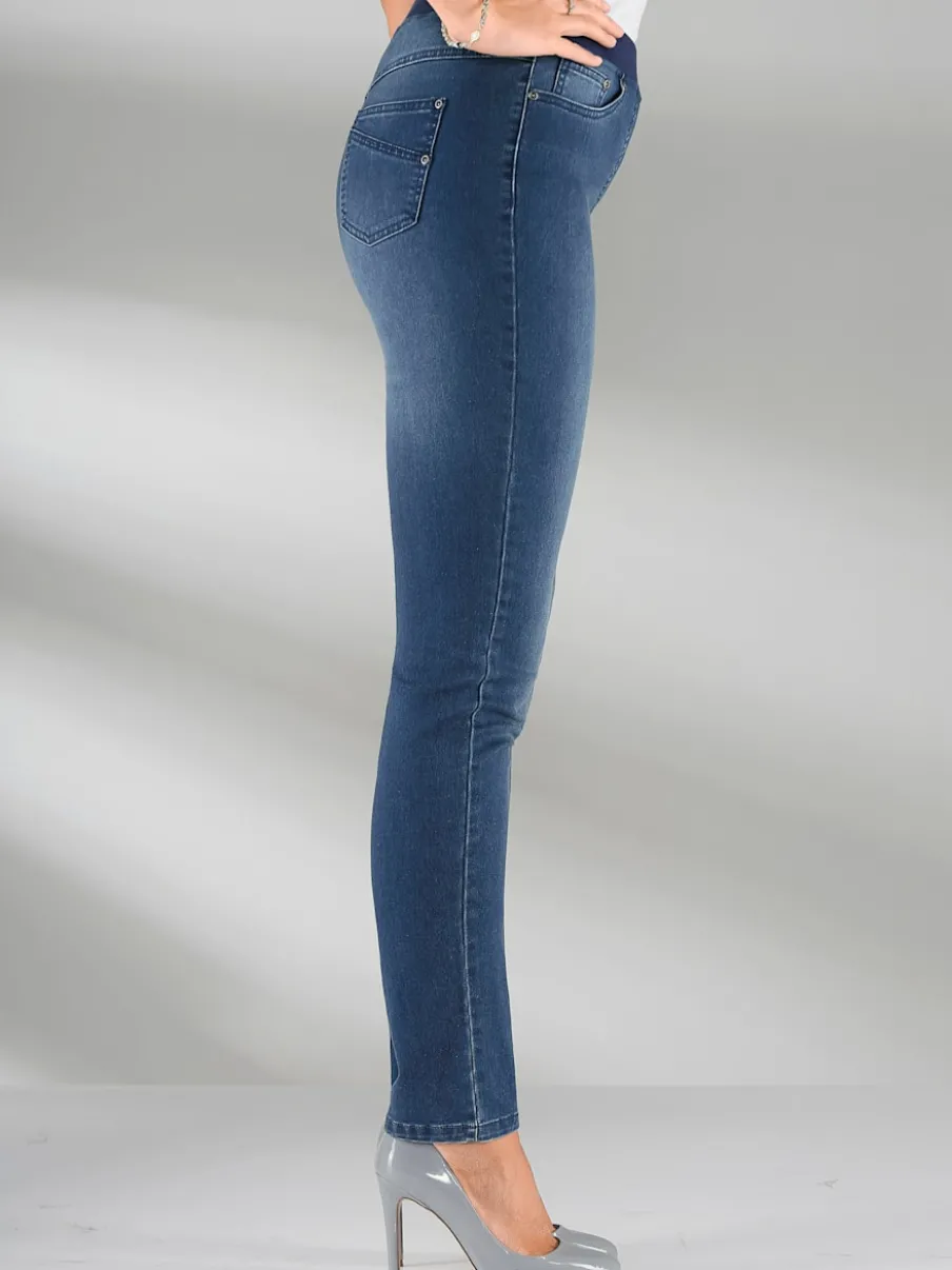 Jean facile à enfiler avec ceinture élastique intégrée.