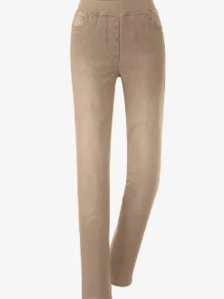 Jean facile à enfiler avec ceinture élastique intégrée.