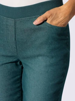Jean facile à enfiler avec ceinture élastique intégrée.