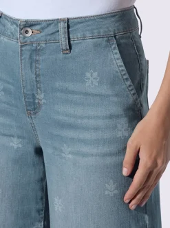 Jean à jambes larges avec imprimé floral et poches