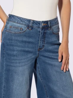 Jean à jambes larges avec style cinq poches en denim