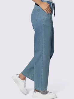 Jean à la coupe large avec ceinture élastique ajustable