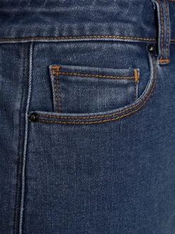 Jean longueur cheville avec coupe barrel et poches arrière