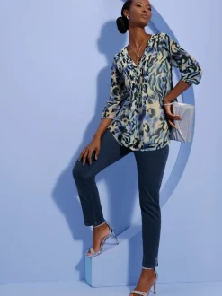 Jean 5 poches ultra-extensible avec détail léopard et confort