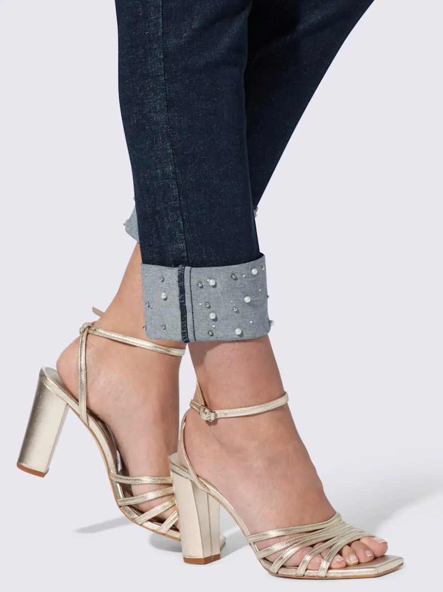 Jean push-up avec revers à perles et pierres décoratives